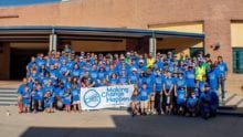 A large group of Comcast Cares Day volunteers.