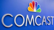 Comcast logo on the wall