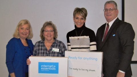 Four presenters at the Internet Essentials Champions event.