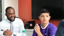 Shane Portfolio, Senior Vice President of Strategic Engineering Projects at Comcast sitting with mentee Paul