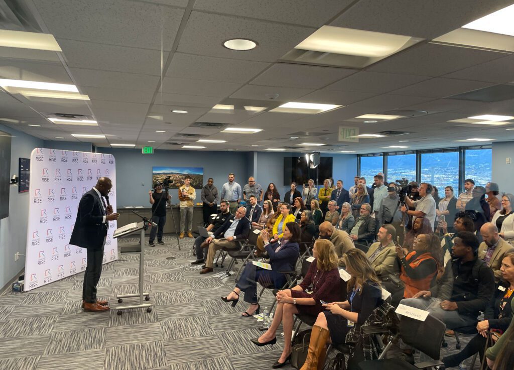 Colorado Springs Mayor Yemi Mobolade speaking to attendees at the Comcast RISE announcement event in Colorado Springs.