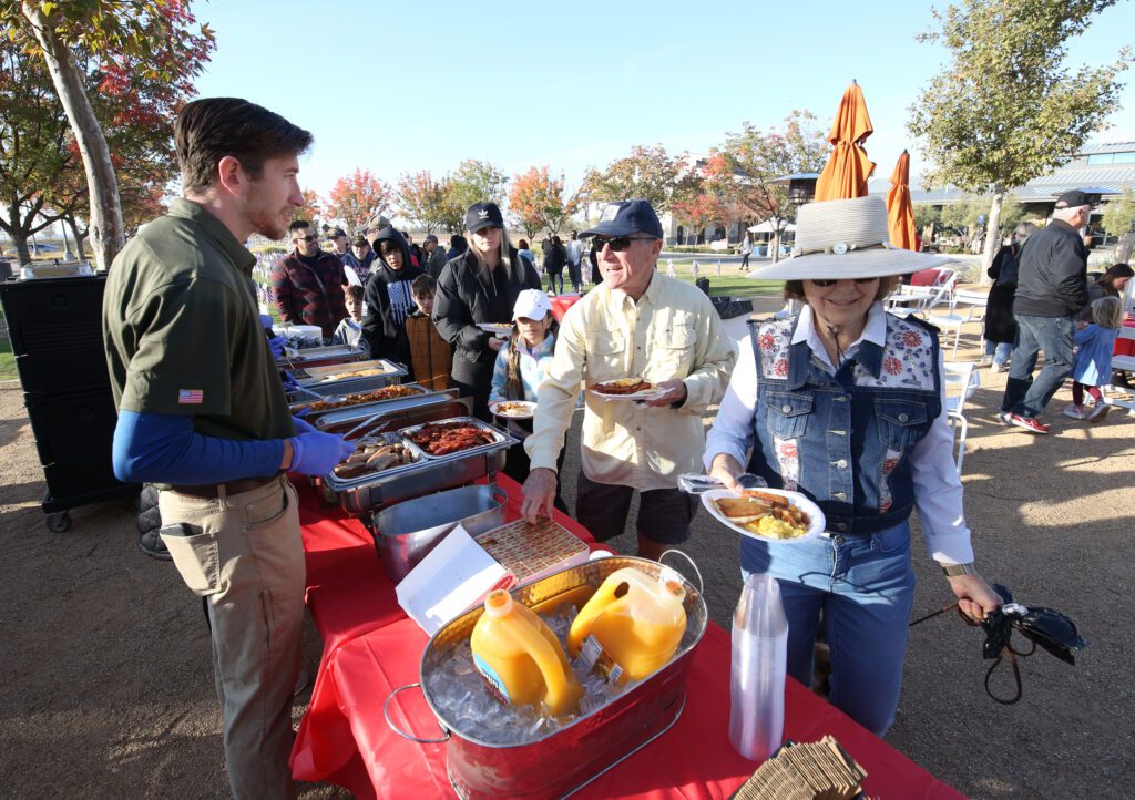 Guests getting their meals at Tesoro Viejo's Veterans Day Pancake Breakfast 2023.