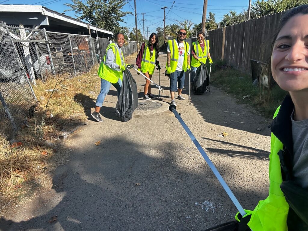 Comcast California team cleans alley in Rowell Elementary School neighborhood