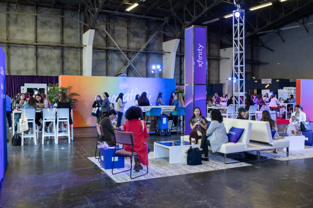 Attendees enjoy the Xfinity lounge at the Latinas in Tech Summit on Thursday, May 16, 2024 in San Francisco
