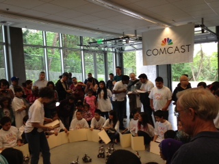 Student competitors and onlookers gather for the robotics competition at TAF's Tech Expo on May 18.