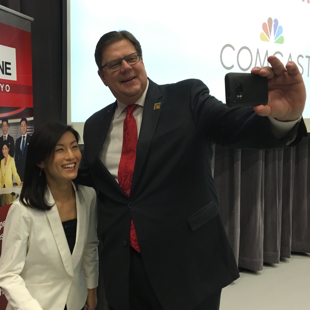 NHK World news anchor Minori Takao poses for a selfie with Bates Technical College President Dr. Ron Langrell.