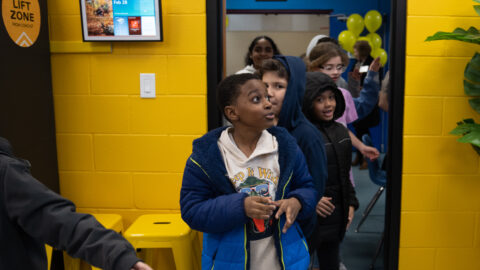 Kids from the Boys & Girls Club enter the Enhanced Lift Zone.