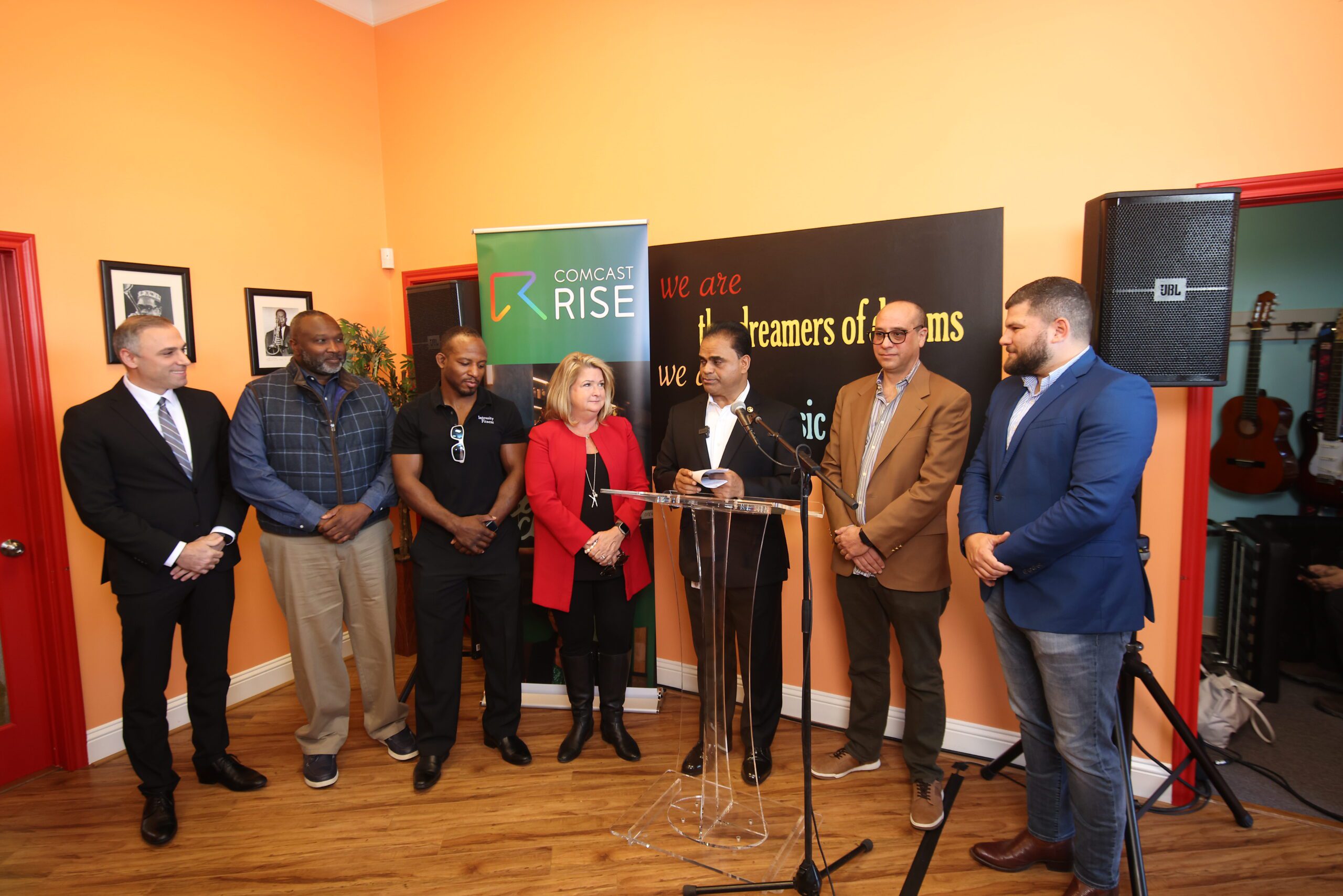 Comcast team members, Fort Bend County Judge KP George, and several community leaders gathered at Groove Music School.