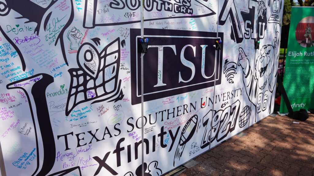 Close up of TSU Xfinity signature wall featuring many colorful messages