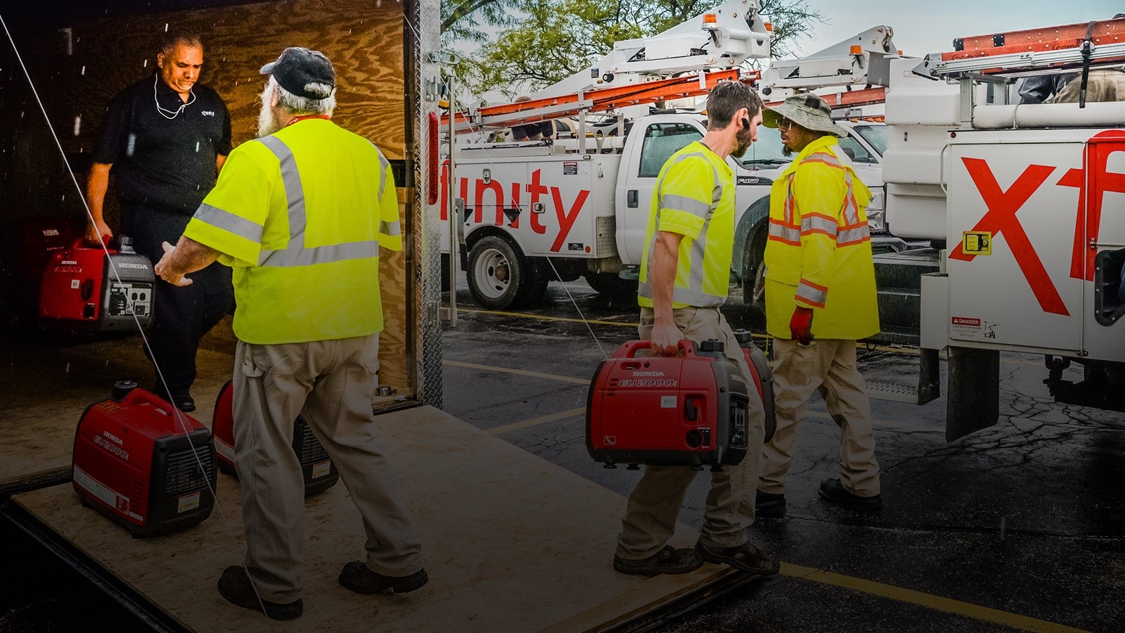 Xfinity response team taking generators from truck