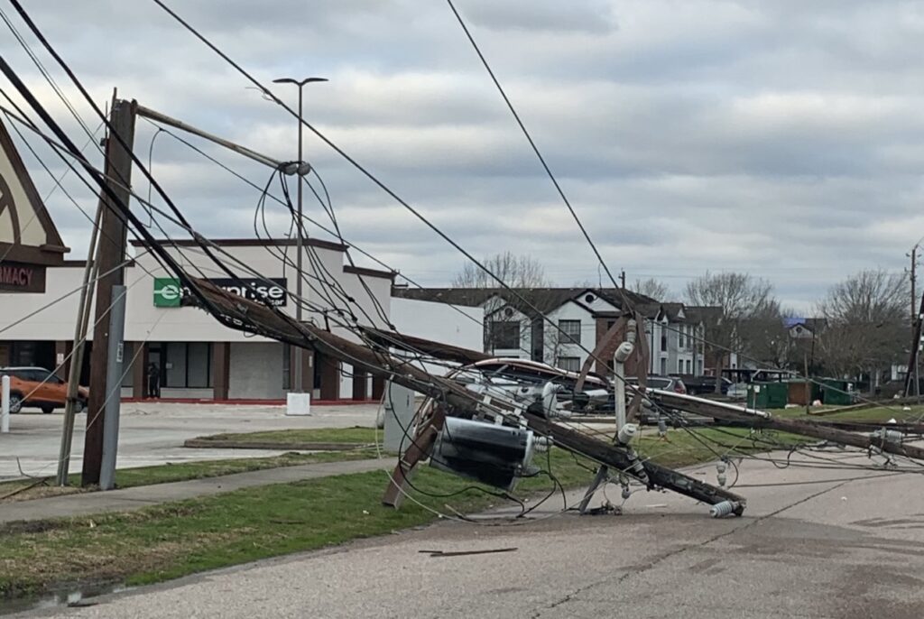 Powerline down and touching street