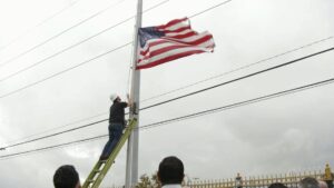 Local Patriots Replace Worn American Flags For Free