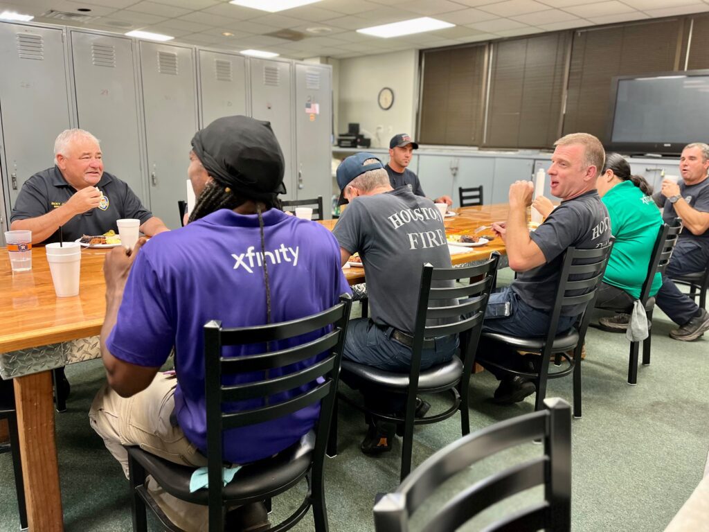 Xfinity Techs Eating BBQ with Firefighters