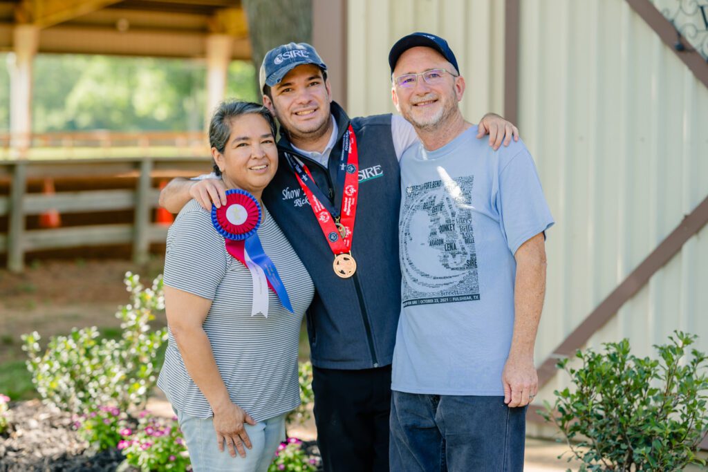 SIRE rider Ricky hugs his parents Laura and Steve Walsh.