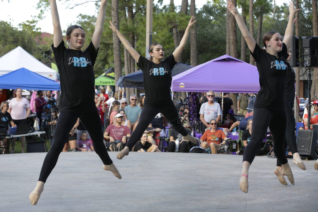 A performace by RB Dance Works on the stage during the Comcast Kingwood Takeover, held at the Kingwood Town Center Park on Saturday, Oct. 28, 2023 in Kingwood, TX. (Michael Wyke/AP Images for Comcast)