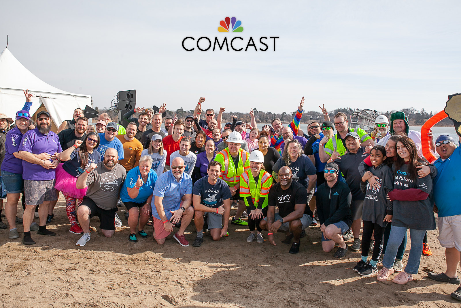 Polar Plunge participants from Comcast Midwest Region pose for a photo before their big jump