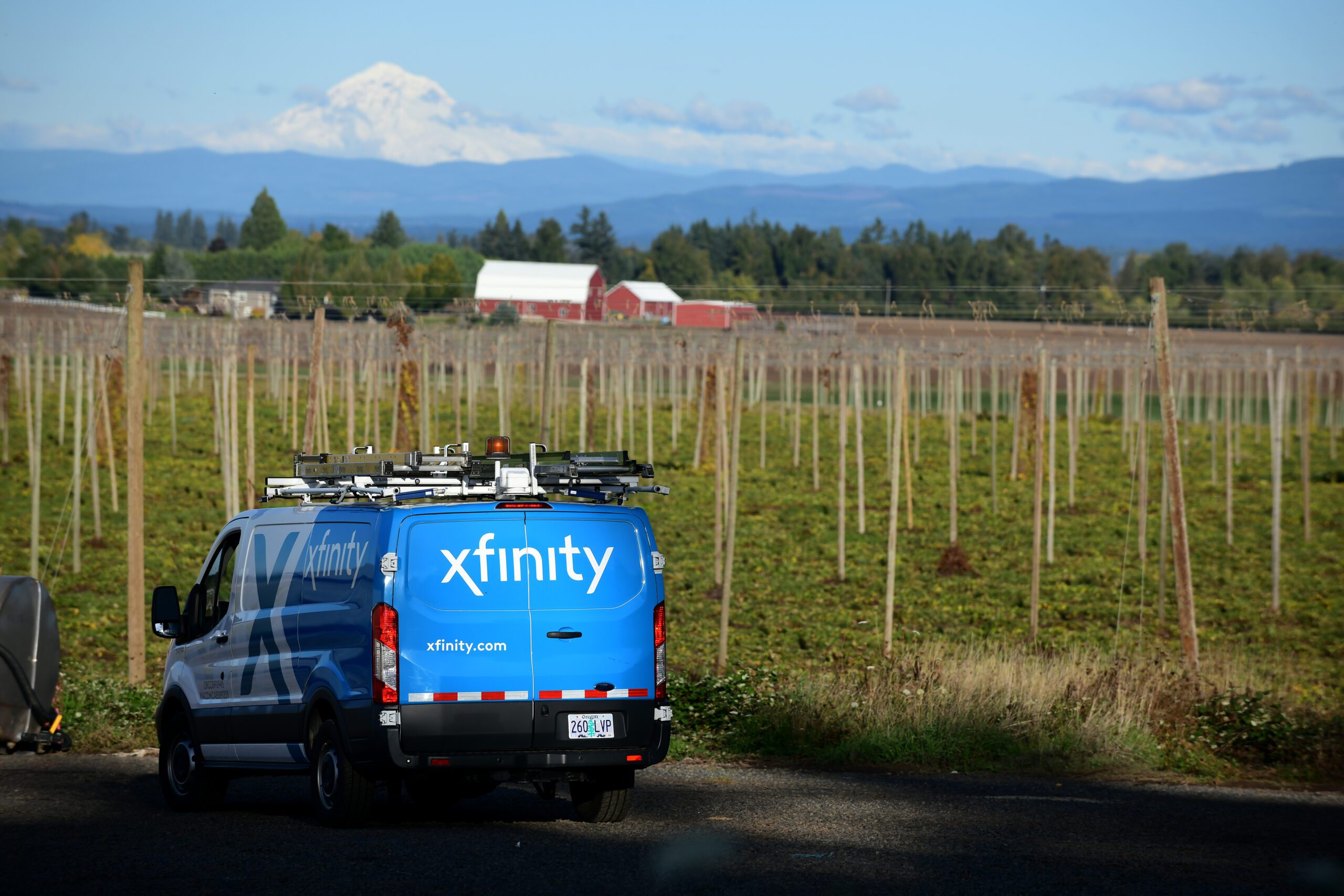 An Xfinity truck in a field in Mt. Angel.