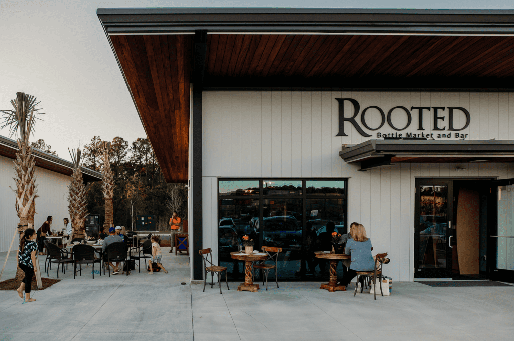 People dining outside at Rooted
