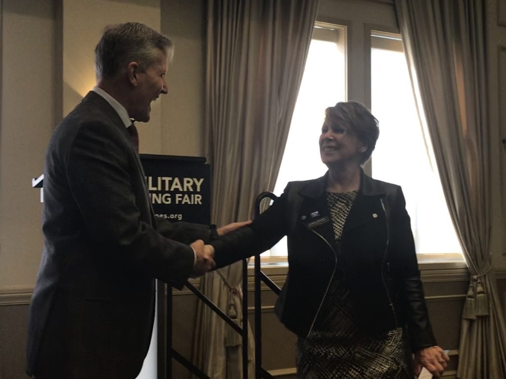 Senior Vice President of Military and Veterans Affairs for Comcast, Brigadier General (Ret.) Carol Eggert onstage at a military hiring fair.