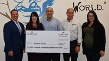 Dawn Stagliano, Director of Government Affairs and Community Impact for Comcast in Broward County, presented HandsOn Broward with a check.