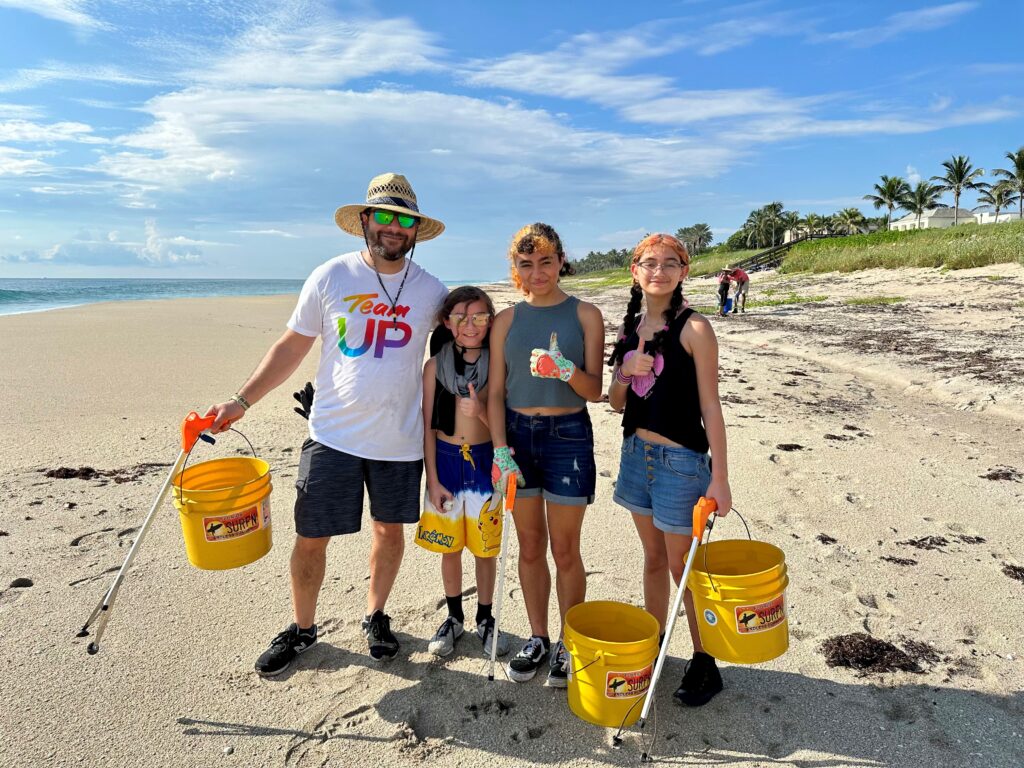 Comcast employees on beach in Palm Beach County