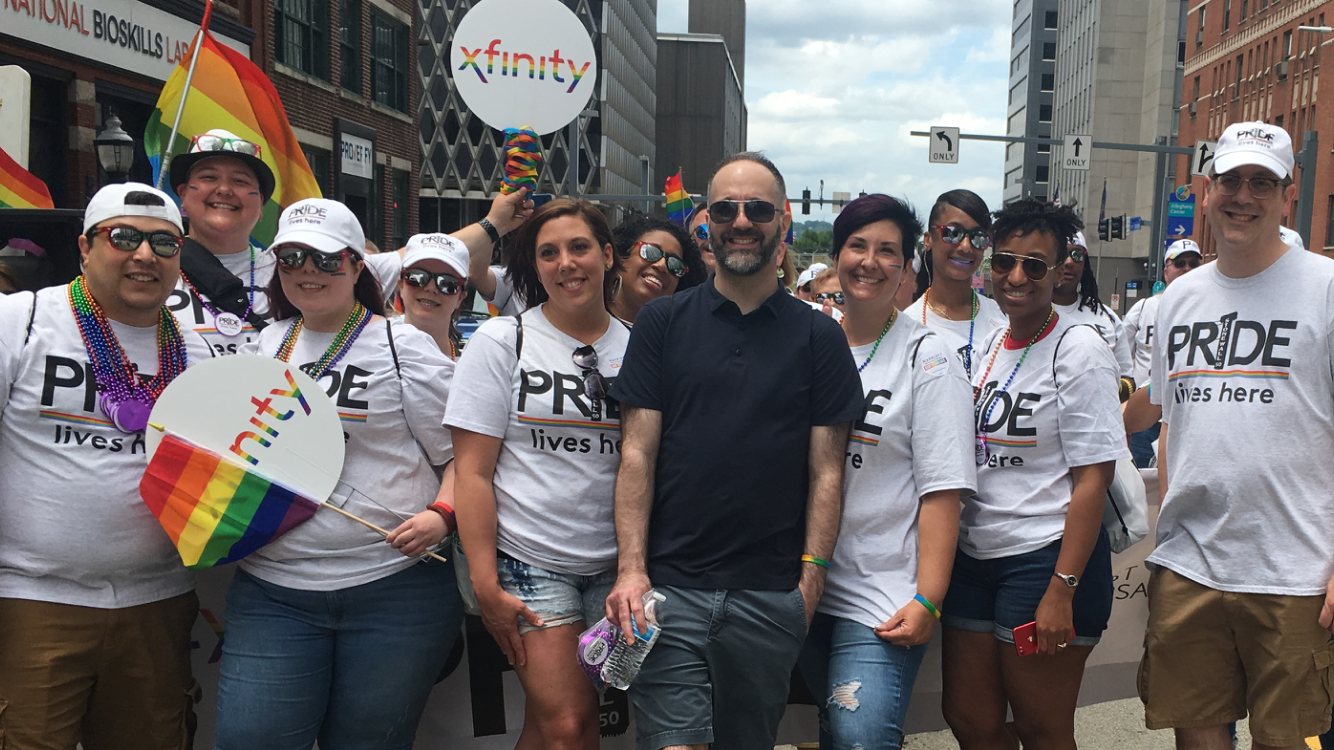 Comcast employees marching at Pittsburgh Pride parade