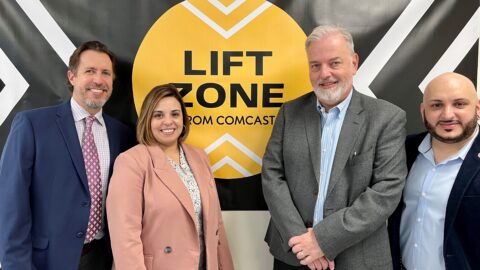 Four people at Comcast Lift Zone