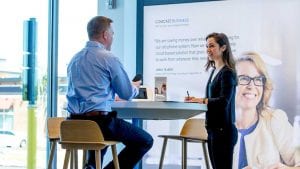 Male and Female having a conversation at an Xfinity Store