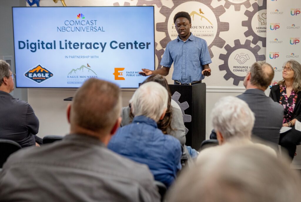 Youth Mayor, Ericsson Ansah-Antiwi speaks during the soft launch ribbon cutting for the Digital Literacy Center at the Eagle Mountain Chamber of Commerce on Thurs., April 25, 2024 in Eagle Mountain, Utah.