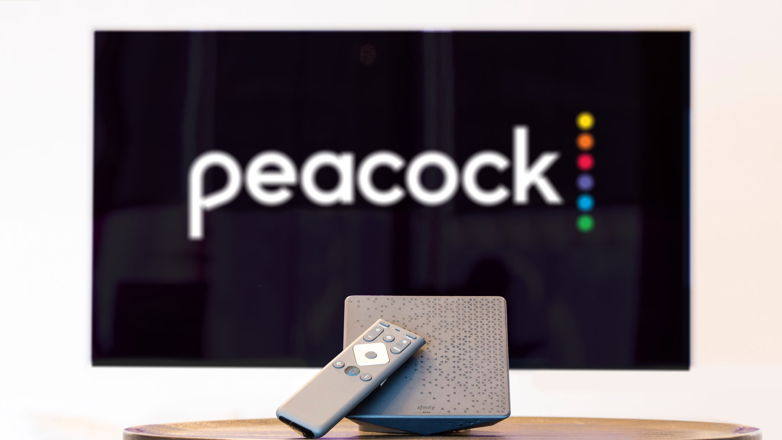 The Peacock logo displayed on a TV