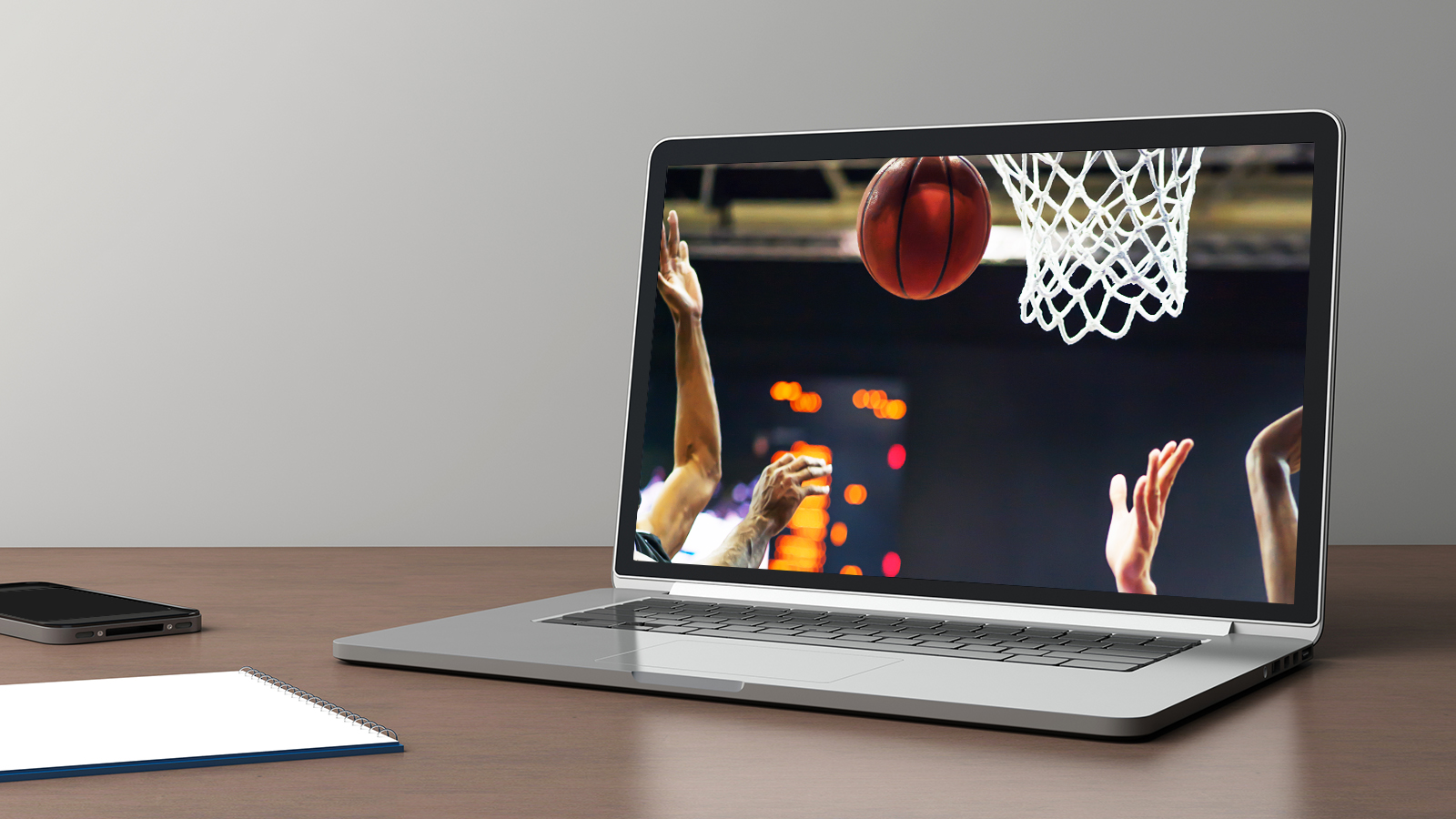 open laptop showing basketball game streaming