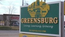 Greensburg sign in front of Xfinity Store.