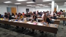 Comcast employees with their Littles in a conference room