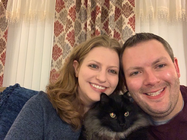 Woman, cat and man
