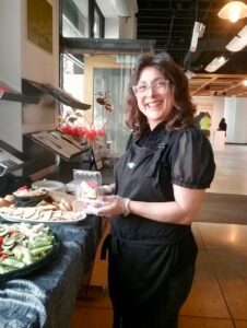 Woman working in restaurant kitchen