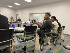 Group of people having a discussion in a conference room